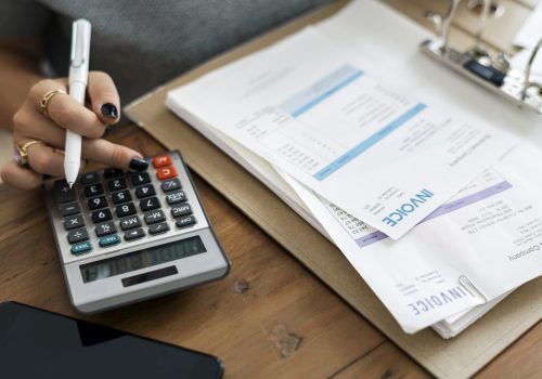 woman-doing-accounting woman-doing-accounting